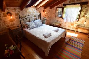 Postel nebo postele na pokoji v ubytování Kidóni Villas