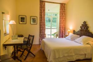 Cama o camas de una habitación en La Posada