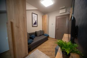 Zona de estar de Manoir Apartments City Center