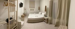 Кровать или кровати в номере Hotel Benois
