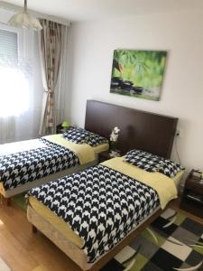 Postel nebo postele na pokoji v ubytování Zen apartman