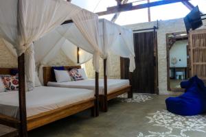 Letto o letti in una camera di Chanteak Bali