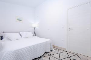 Postel nebo postele na pokoji v ubytování Apartment "Dida" with Free Private Parking