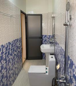 Ванная комната в SAINT-LOUIS IMMO