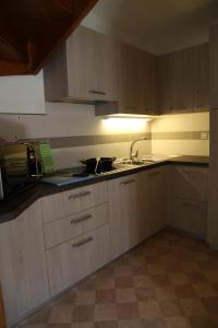 A kitchen or kitchenette at APPARTAMENTO VALENTINI