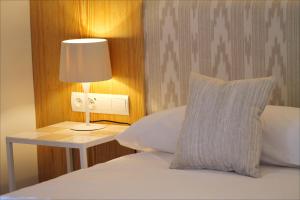A bed or beds in a room at Sóller Center