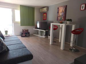 Posedenie v ubytovaní Apartman Nola