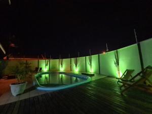 Vila Itanhaém内部或周边的泳池