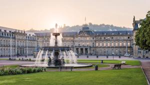 a fountain in front of a large building at Adagio Access Stuttgart Airport Messe in Leinfelden-Echterdingen