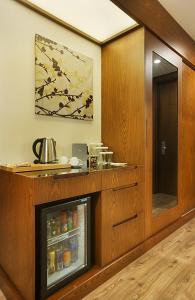 A kitchen or kitchenette at Dedeman Erbil Hotel City Center