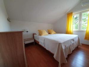 Postel nebo postele na pokoji v ubytování Apartment Majer