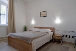 Posteľ alebo postele v izbe v ubytovaní Seafront apartment Marina + 26 fotografií