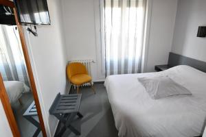 Postel nebo postele na pokoji v ubytování Le Pasteur