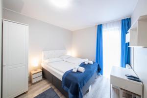 Posteľ alebo postele v izbe v ubytovaní Hotel Nowa Panorama