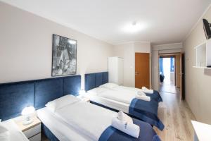 Posteľ alebo postele v izbe v ubytovaní Hotel Nowa Panorama