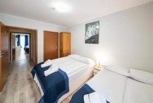 Posteľ alebo postele v izbe v ubytovaní Hotel Nowa Panorama
