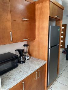 Kuchyň nebo kuchyňský kout v ubytování Herradura VIP Inn