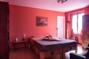 Postel nebo postele na pokoji v ubytování CASA NEL BORGO