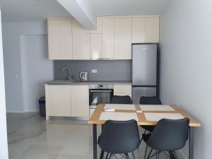 Kuchyň nebo kuchyňský kout v ubytování Bellissima Apartments