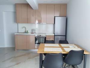 Kuchyň nebo kuchyňský kout v ubytování Bellissima Apartments