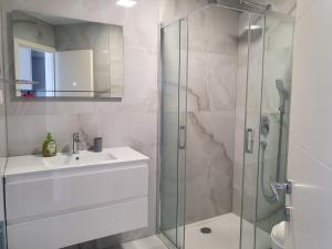 Koupelna v ubytování Bellissima Apartments + 36 fotografií