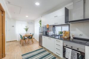 A kitchen or kitchenette at Aguda Beach Porto, Slow Travel Houses