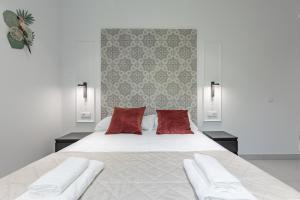 Tempat tidur dalam kamar di Chic & Comfortable Apartment, Private Terrace