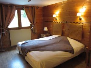 Postel nebo postele na pokoji v ubytování Appart 4 pers 3 étoiles proximité lac et remontées Courchevel Le Praz - Arrayanes