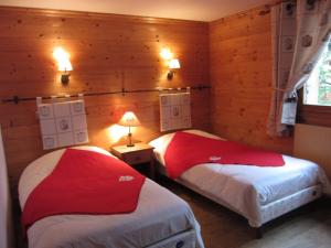 Postel nebo postele na pokoji v ubytování Appart 4 pers 3 étoiles proximité lac et remontées Courchevel Le Praz - Arrayanes