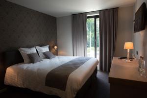 Letto o letti in una camera di Hotel De Lissewal