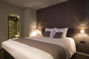 Letto o letti in una camera di Hotel De Lissewal