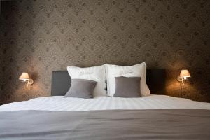 Letto o letti in una camera di Hotel De Lissewal