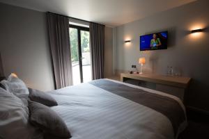 Letto o letti in una camera di Hotel De Lissewal