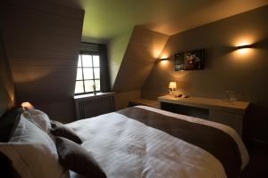 Letto o letti in una camera di Hotel De Lissewal