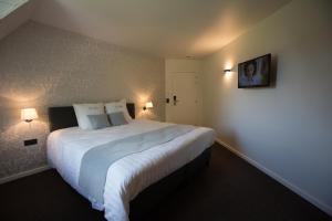 Letto o letti in una camera di Hotel De Lissewal