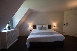 Letto o letti in una camera di Hotel De Lissewal