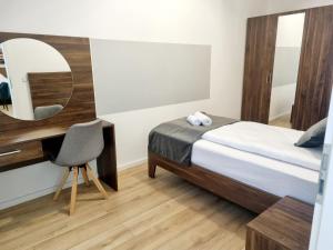 Postel nebo postele na pokoji v ubytování A&F Hotel Chemnitz