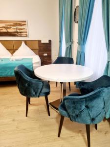 Postel nebo postele na pokoji v ubytování A&F Hotel Chemnitz