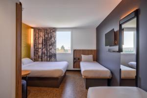 Postel nebo postele na pokoji v ubytování B&B HOTEL Paris Créteil