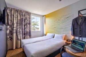 Postel nebo postele na pokoji v ubytování B&B HOTEL Paris Créteil