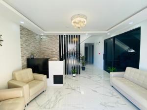 Χώρος καθιστικού στο Besami Hotel