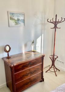 Foto sihtkohas Husum asuva majutusasutuse Gemütliche Wohnung mit Sonnenterrasse im blauen Holzhaus galeriist