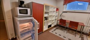 Kuchyň nebo kuchyňský kout v ubytování Apartments Puistokatu + 9 fotografií