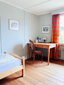 Postel nebo postele na pokoji v ubytování Hotel Gletscherblick
