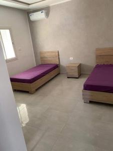 Un ou plusieurs lits dans un hébergement de l'établissement villa Youyou avec piscine privée 049