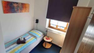 Letto o letti in una camera di Alte Post zu Stetzsch