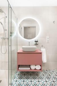 Ett badrum på Okako Apartments Tudela