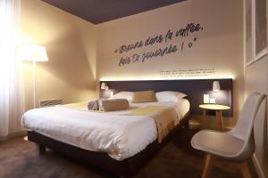 Postel nebo postele na pokoji v ubytování Hôtel Antares & Spa