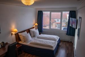 Hotel Phønix Hjørring 객실 침대