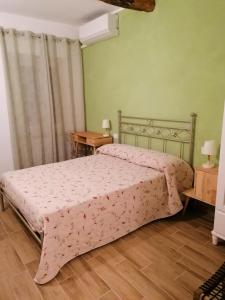 Llit o llits en una habitació de la Mafalda in Oltrepo